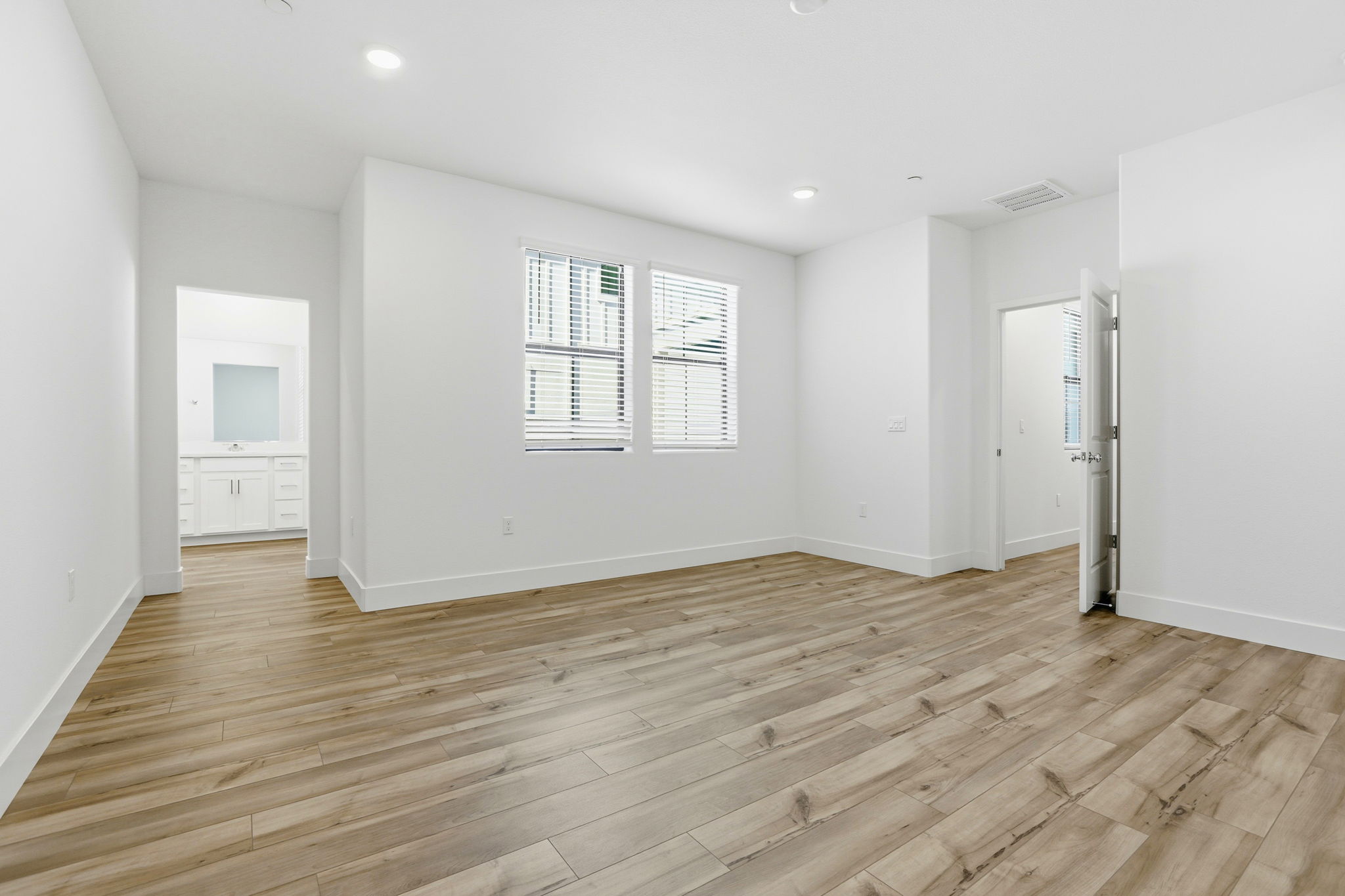 A room with wood floors.
