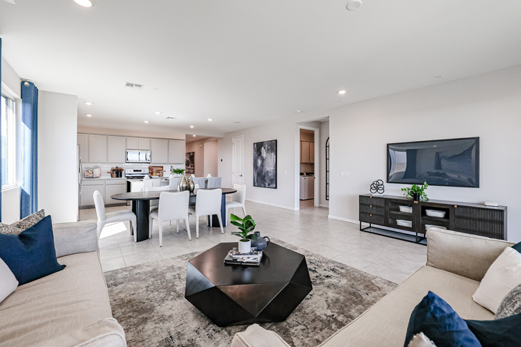 A living room with a tv and couches.