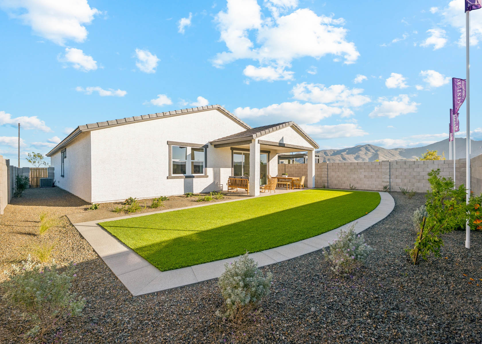 A house with a large lawn.
