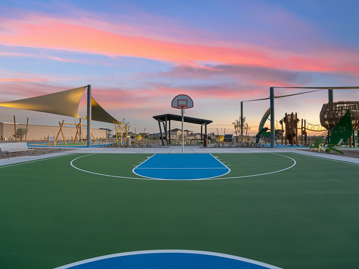 A basketball court with a basketball hoop.