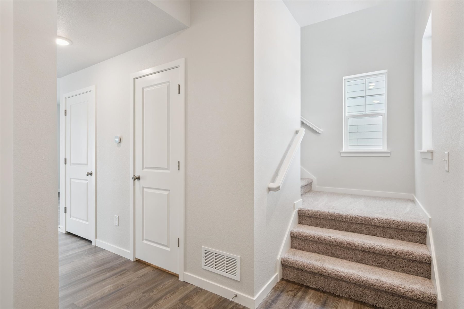 A room with white doors.