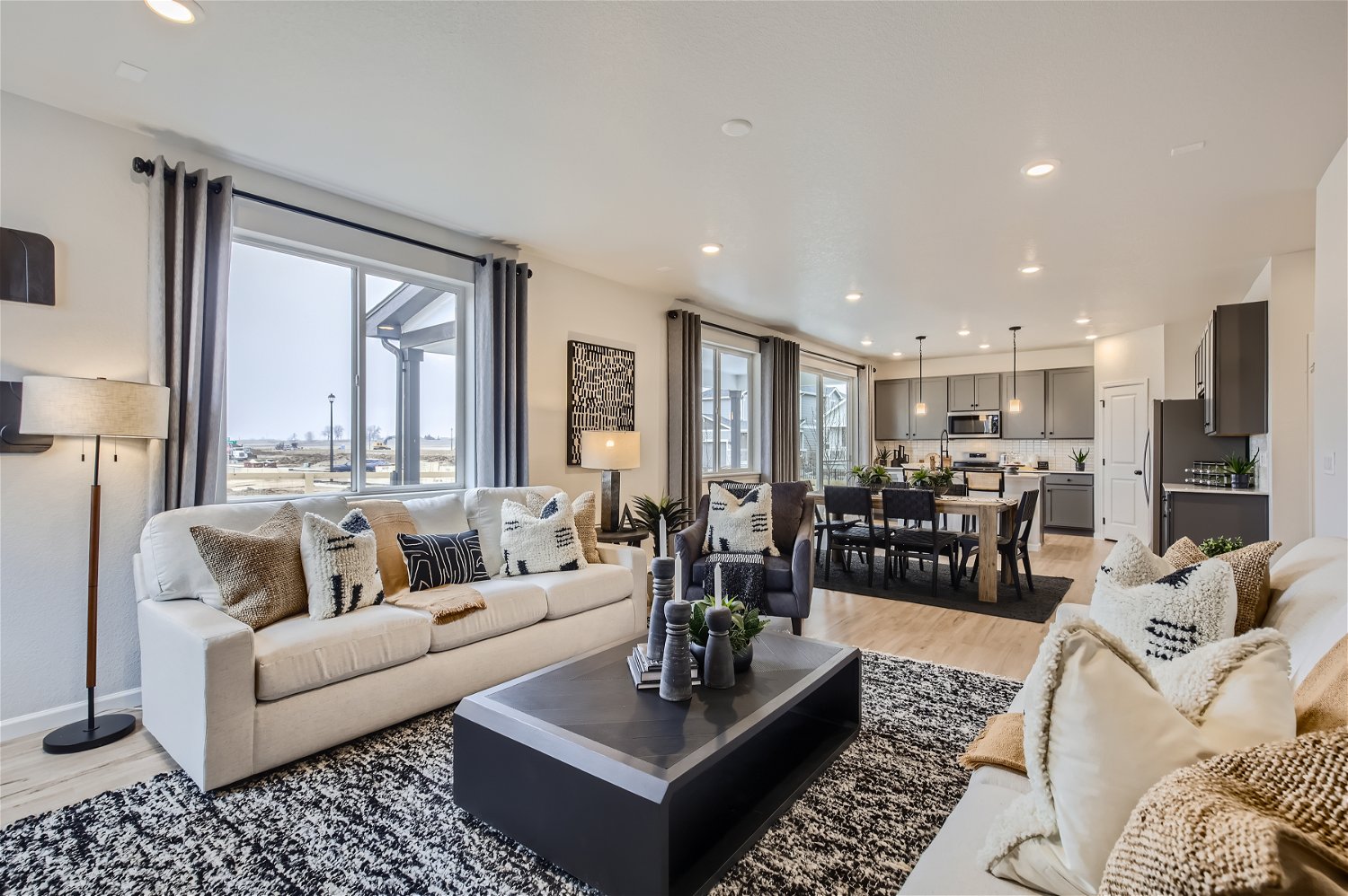 A living room with a large window.