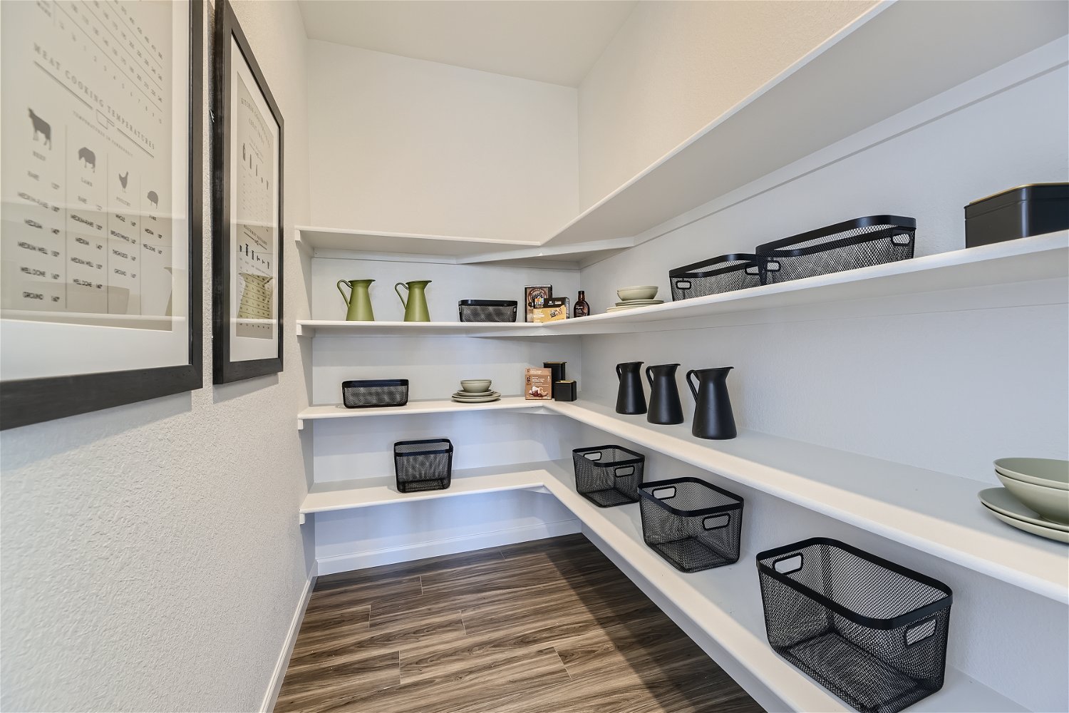 A white shelving unit with shelves.