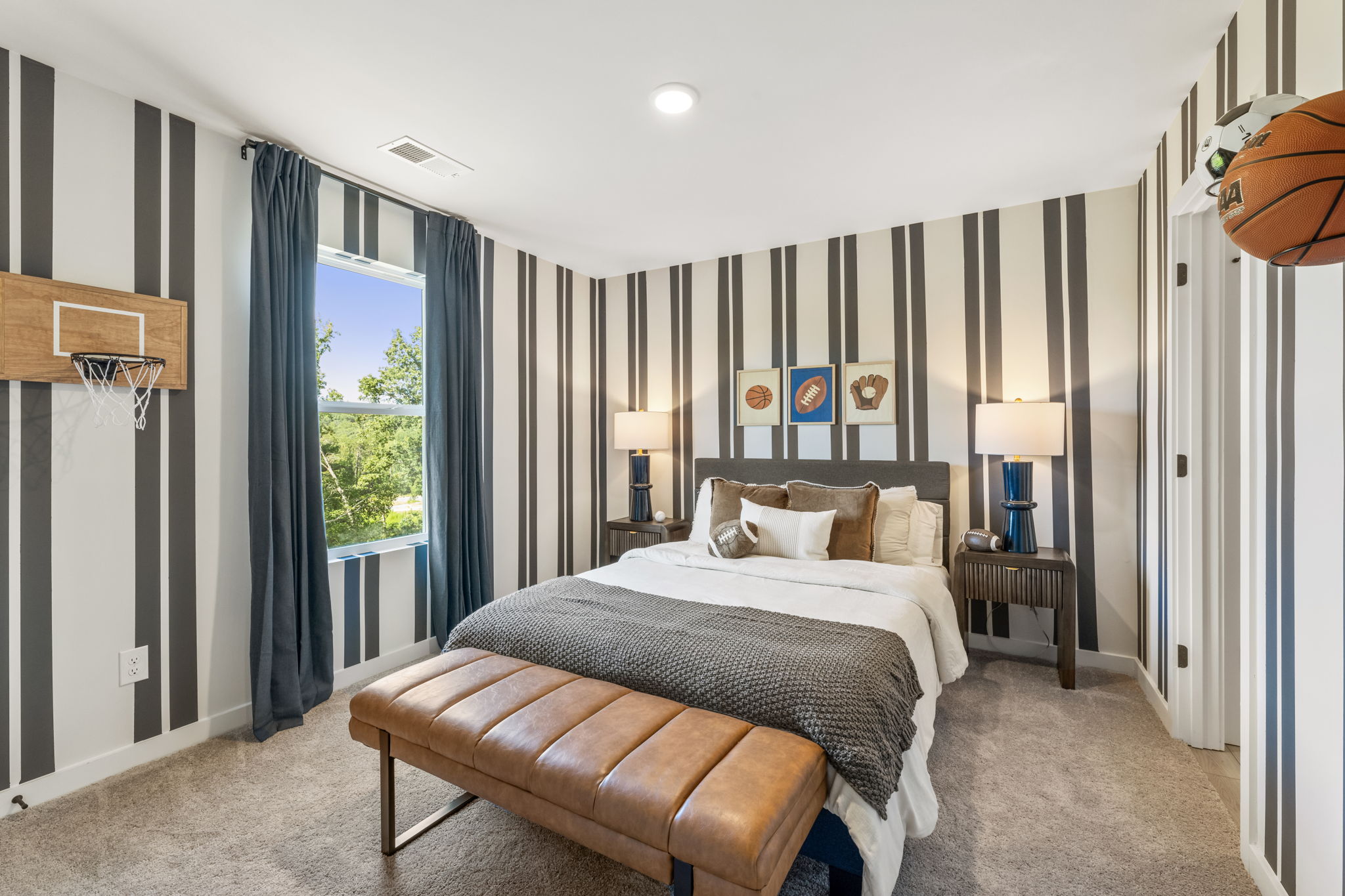 A bedroom with a large bed.