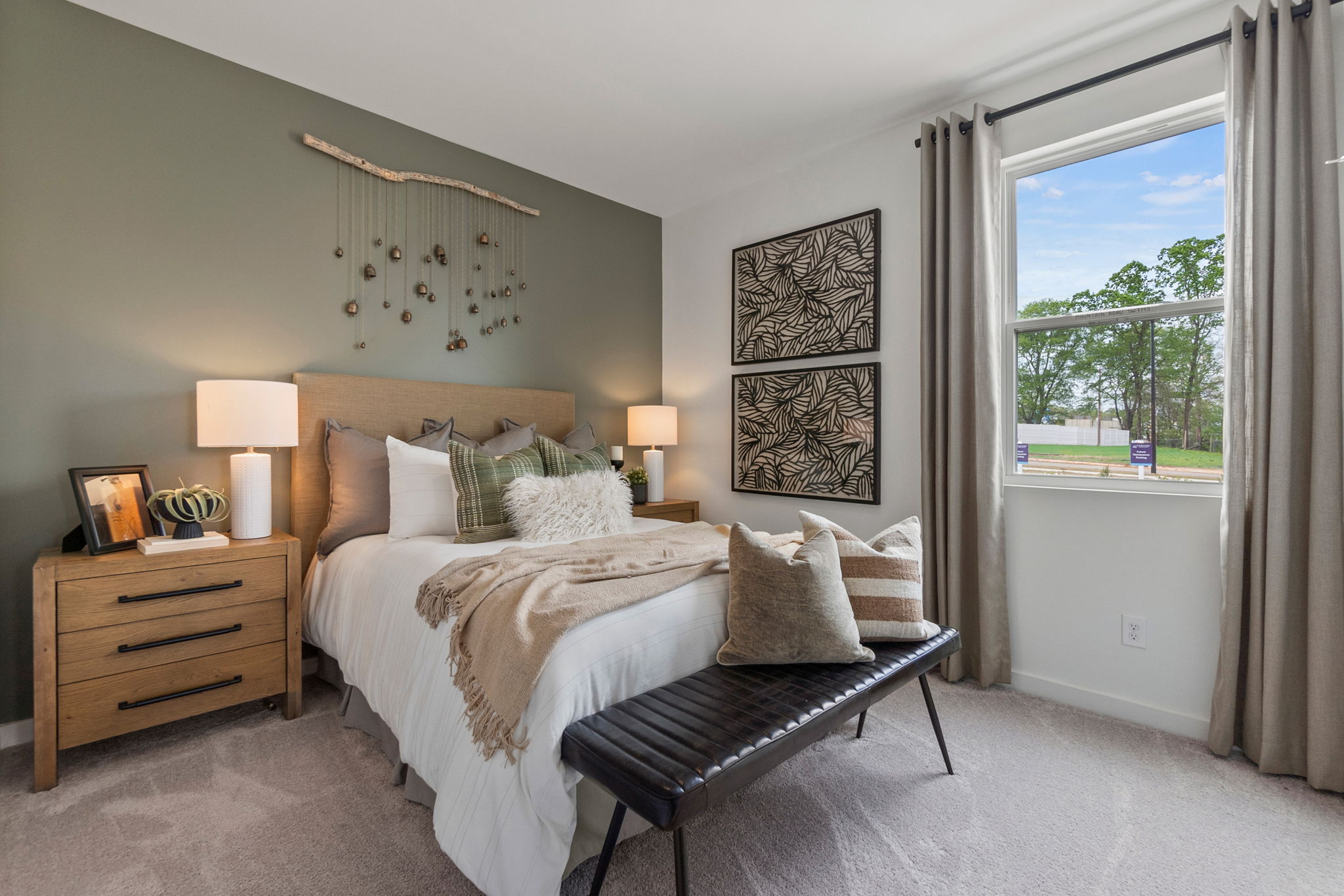 A bedroom with a large bed.