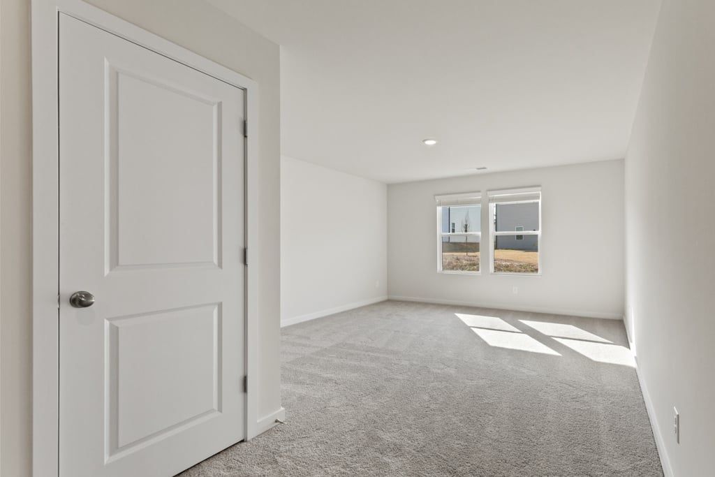 A room with a door and a window.