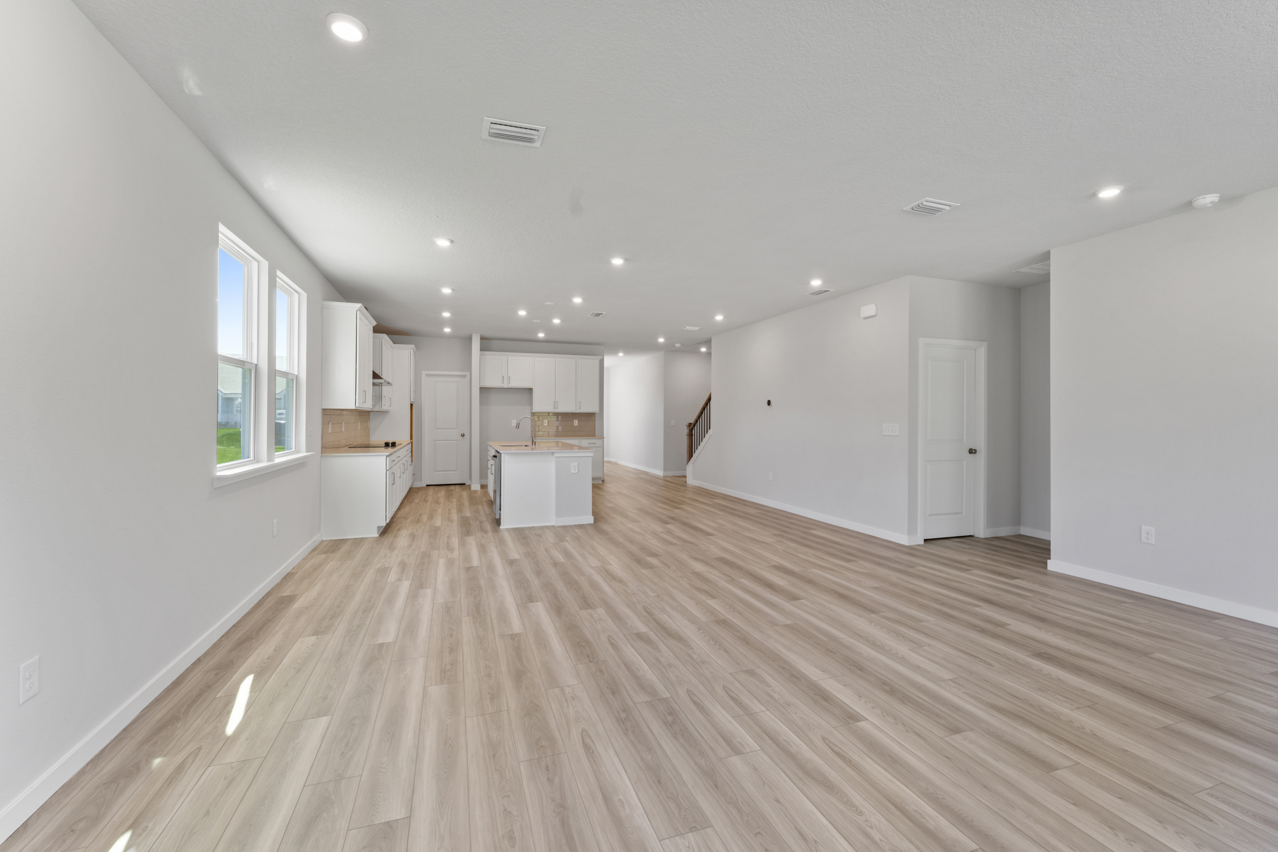 Lot 527 Chef's Kitchen with White Cabinets at NorthShore in Kingsland