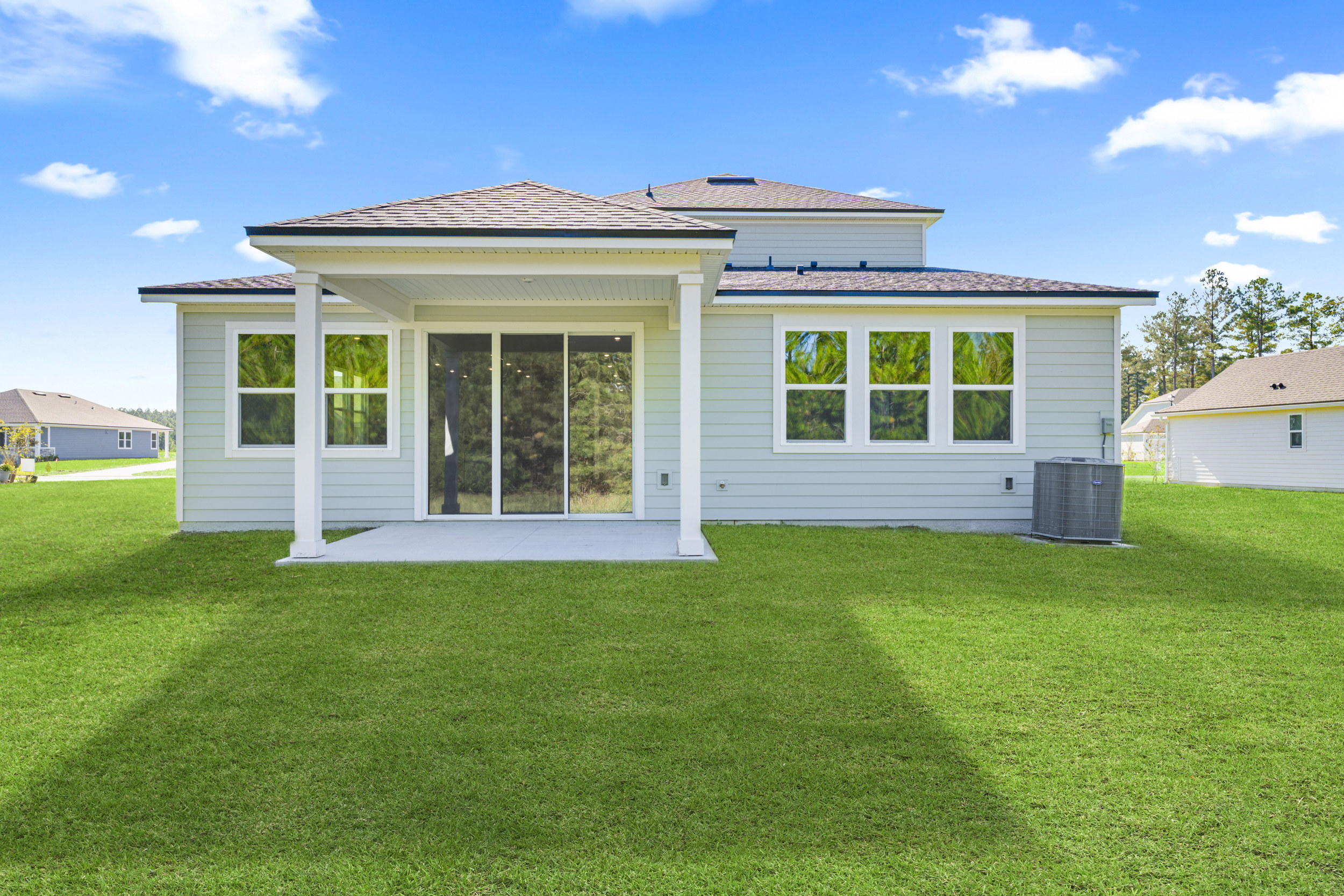 Lot 527 Rear Exterior with Covered Patio at NorthShore in Kingsland
