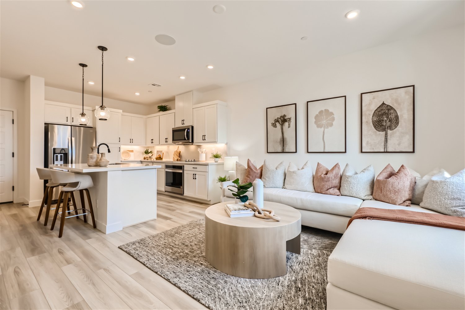 A living room with a couch and a table.