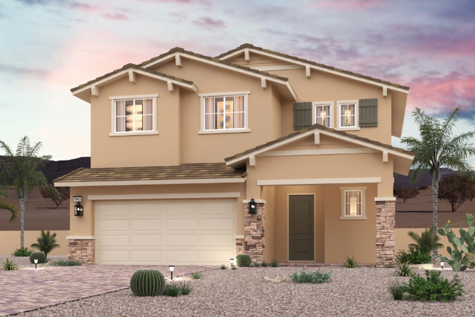 A house with a garage and palm trees.