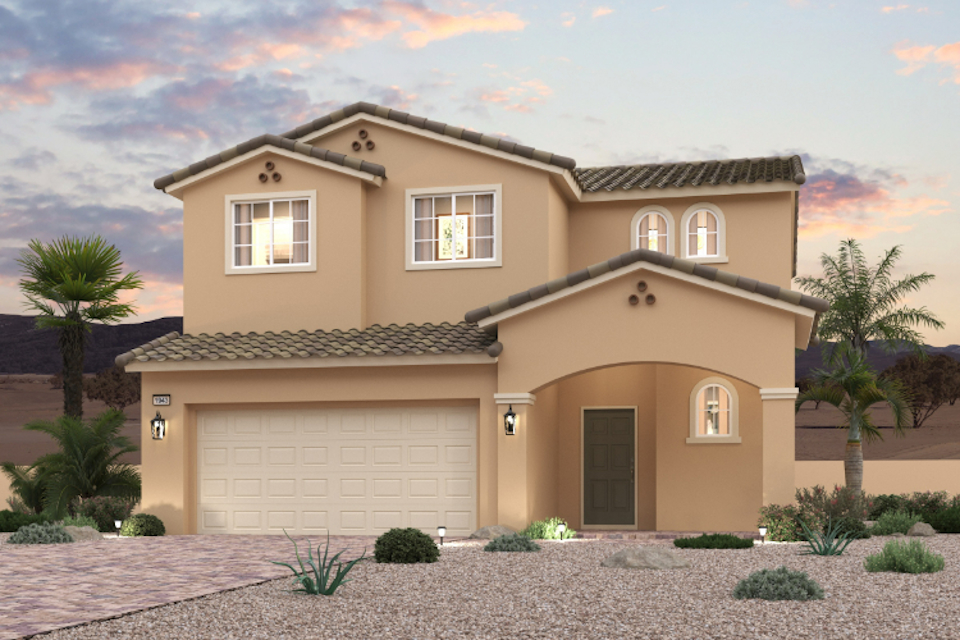 A house with a garage and palm trees.