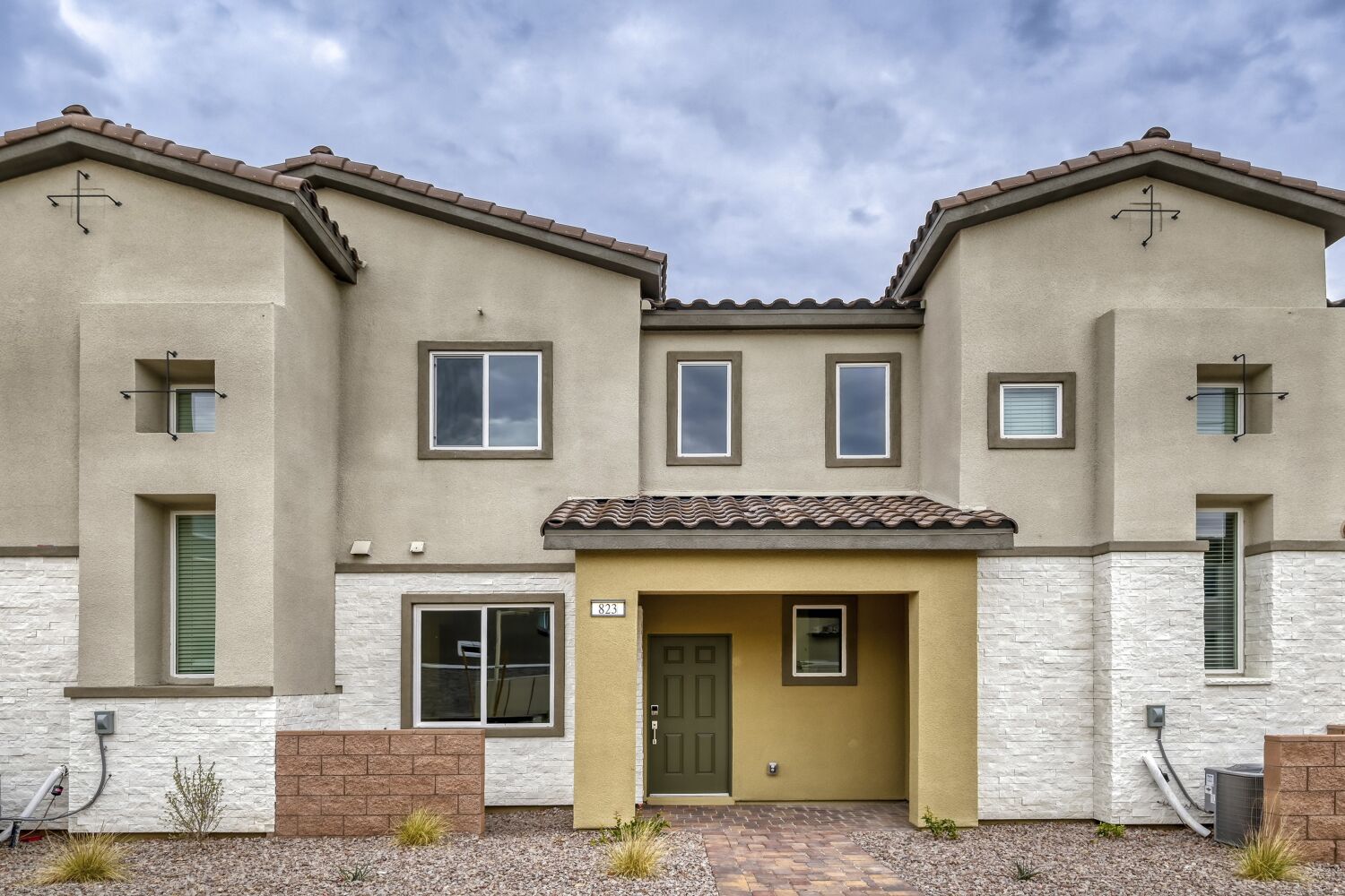 A building with a cross on top.
