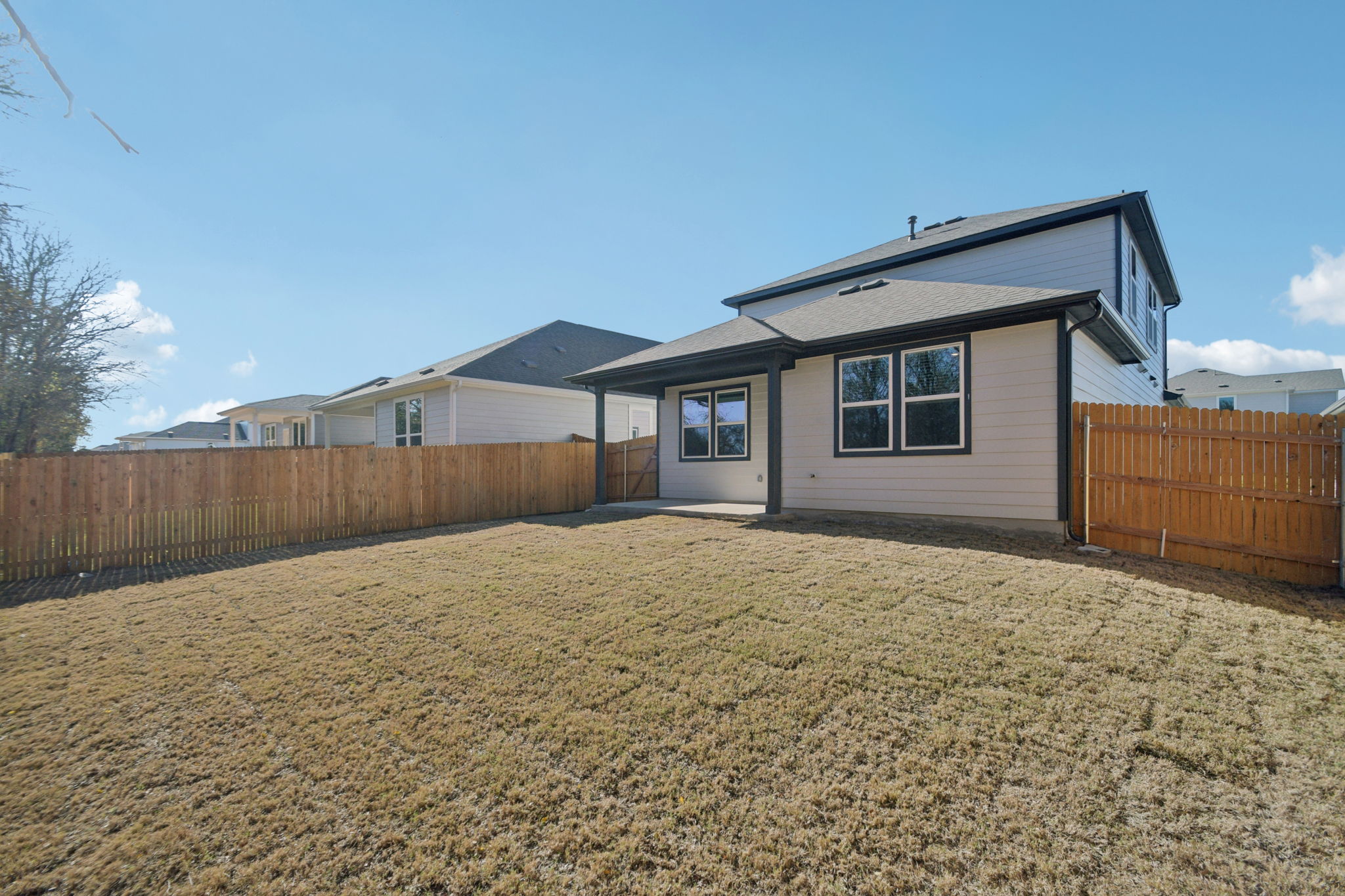 A house with a fence around it.