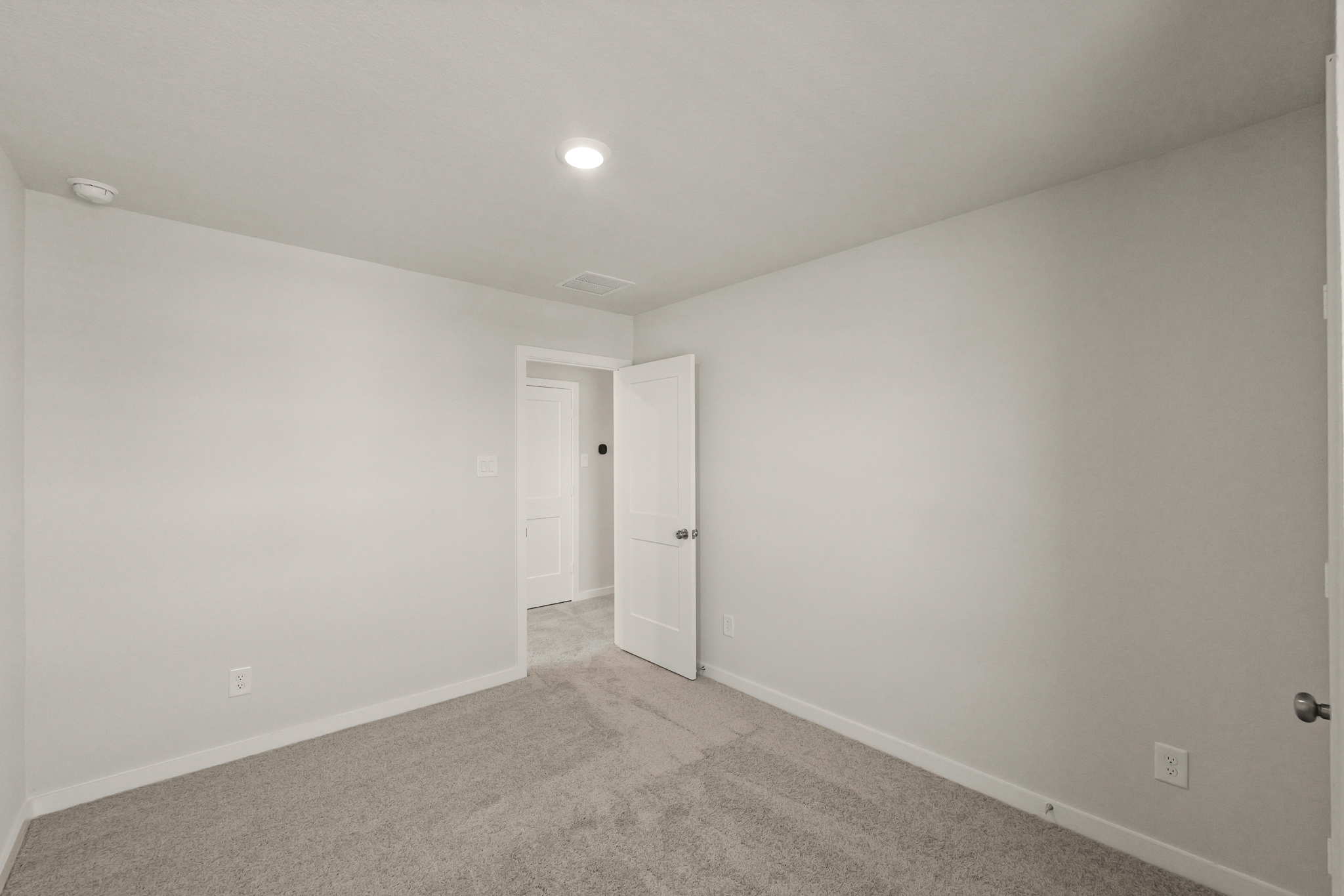 A room with white walls.