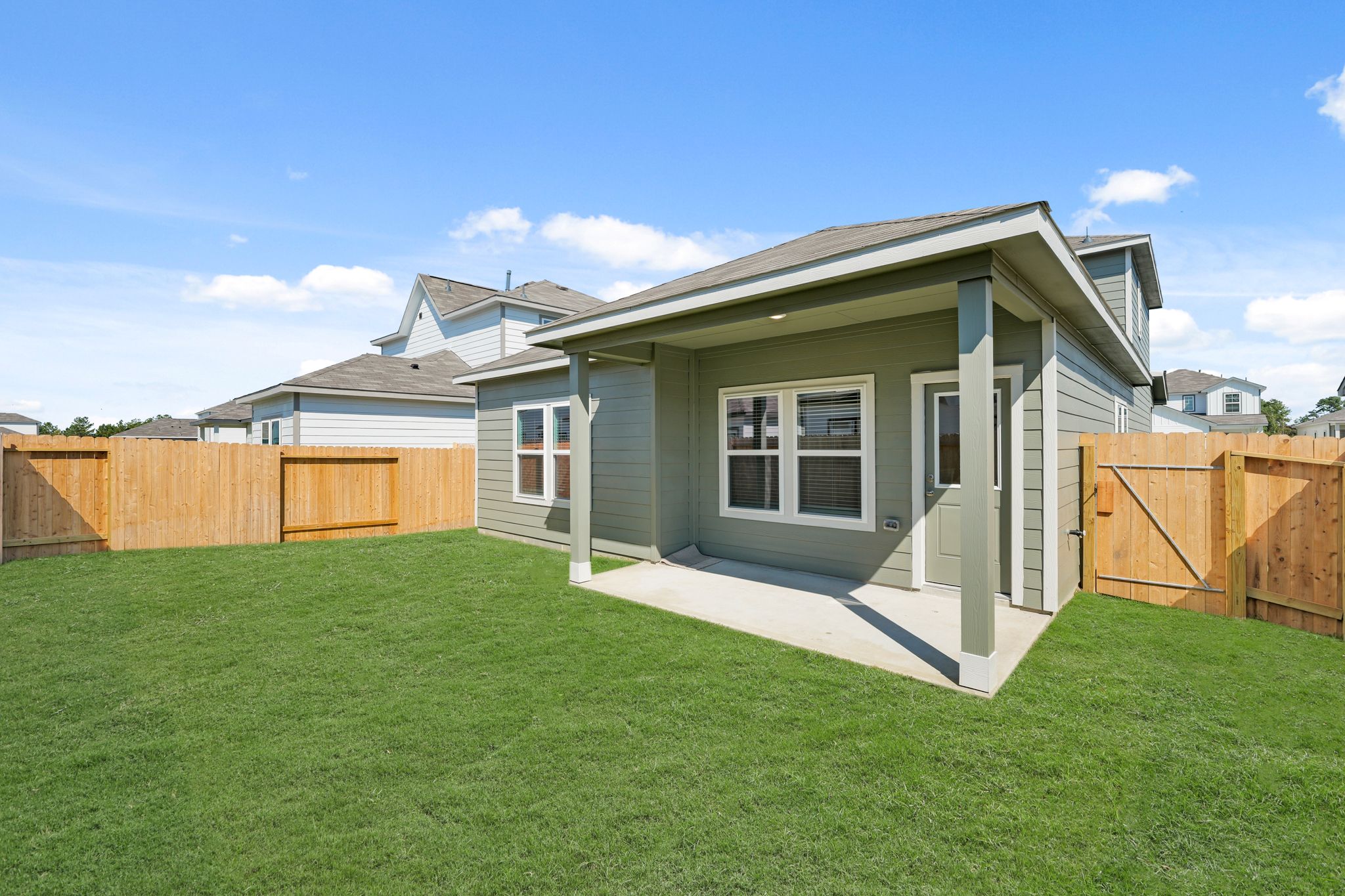 A house with a fence around it.