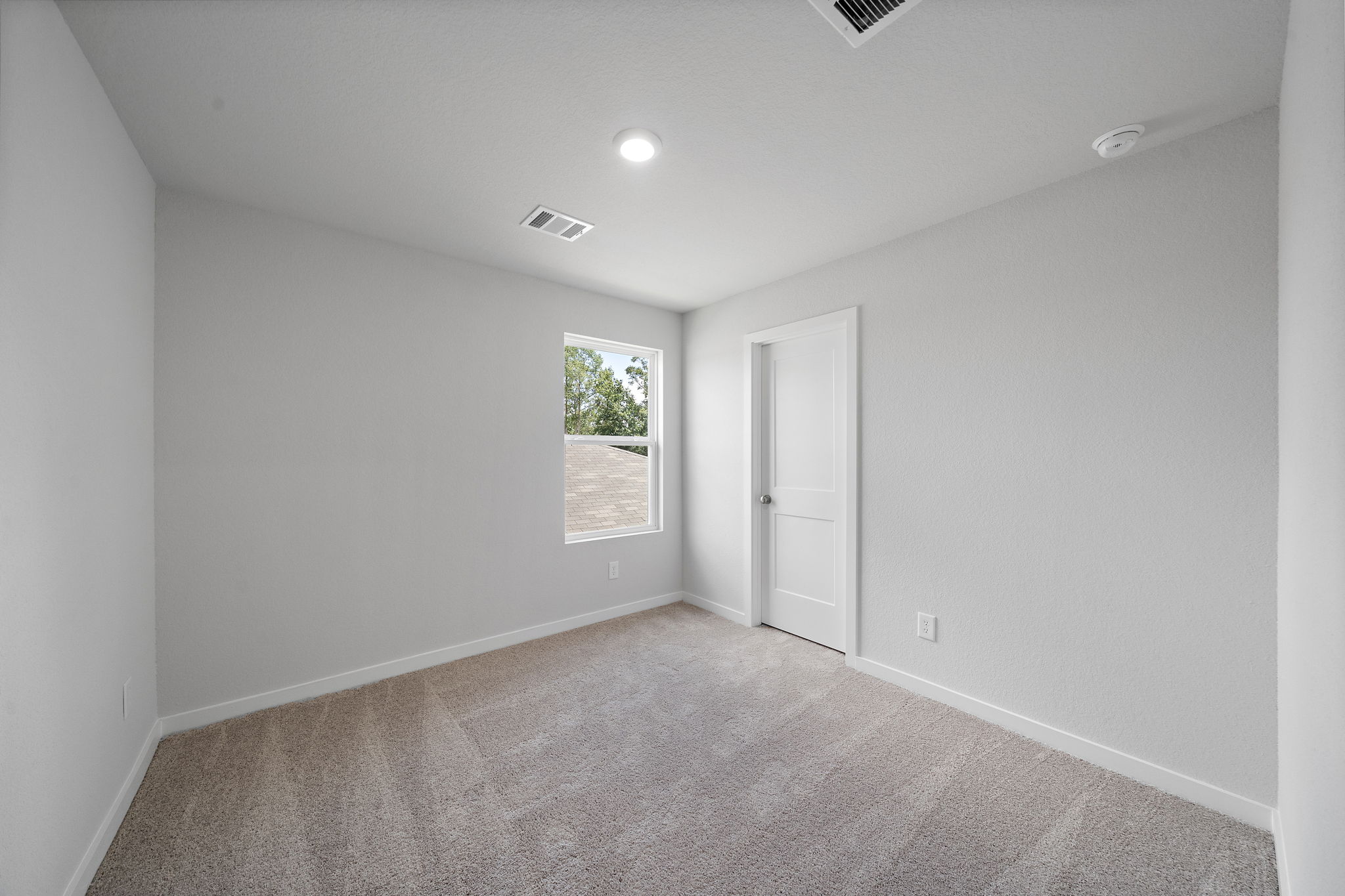 A room with a door and a window.