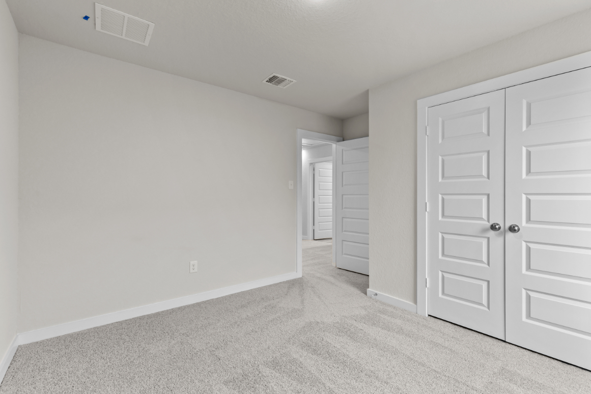 A room with white doors.