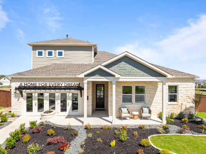 A house with a large front yard.