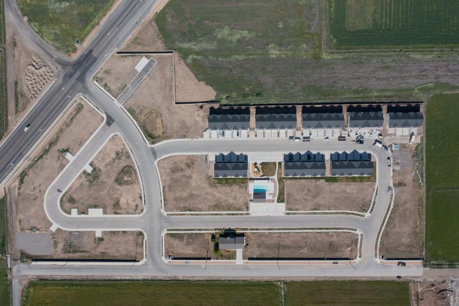 A large building with a pool.