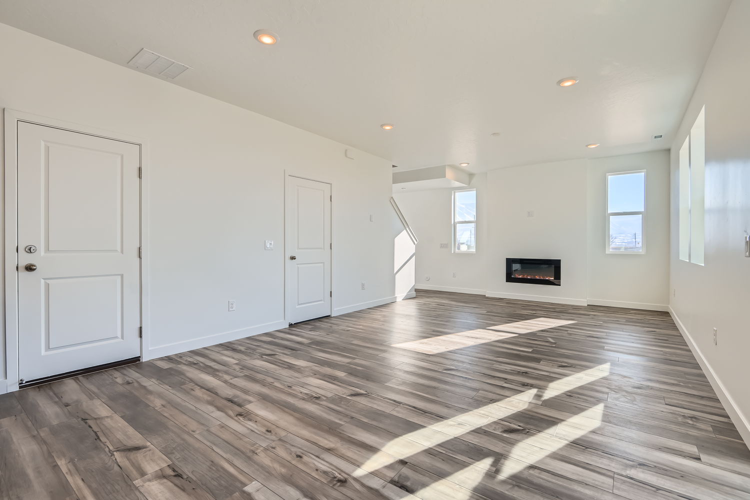 A room with white doors.