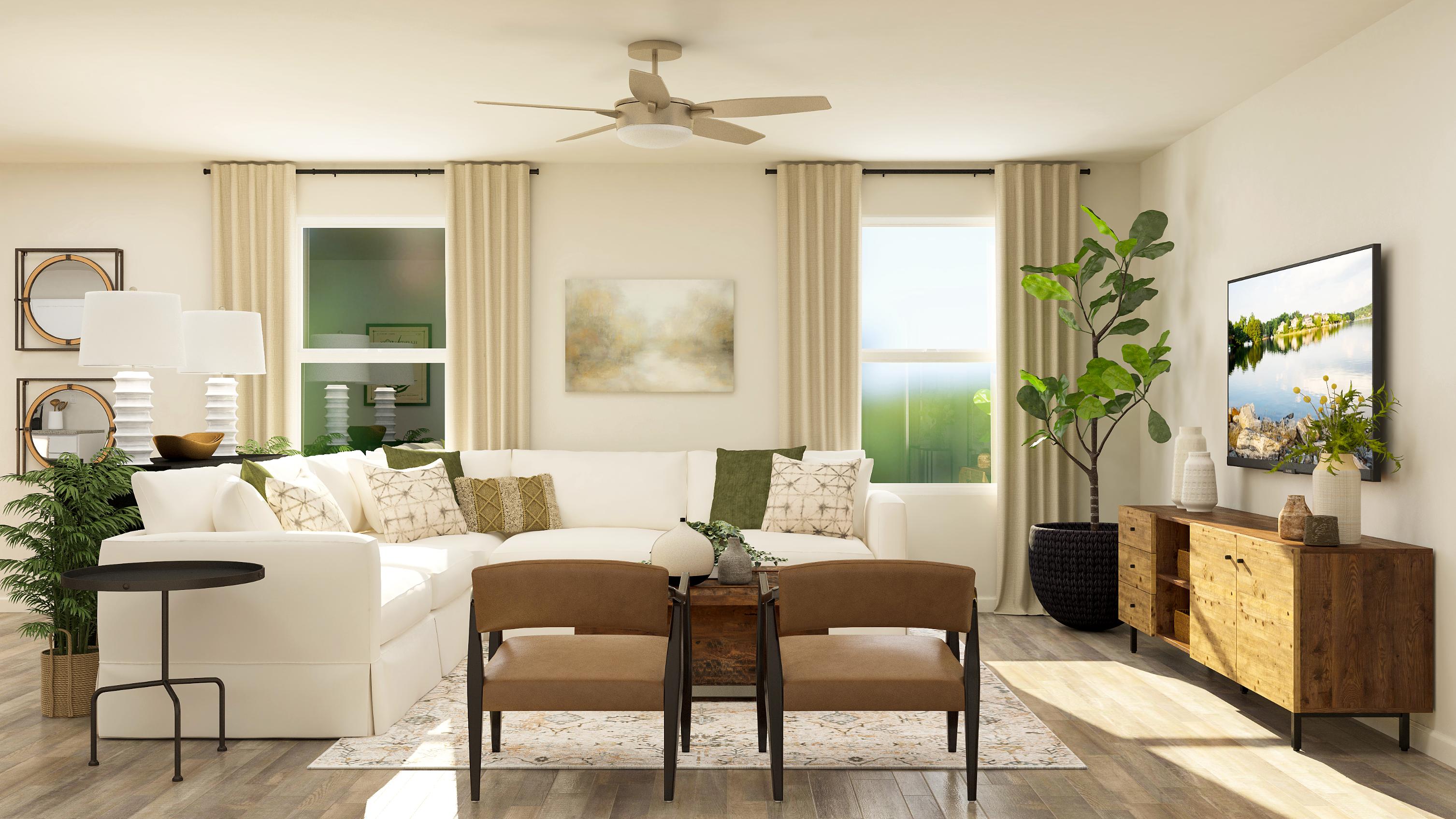 A living room with a couch and chairs.