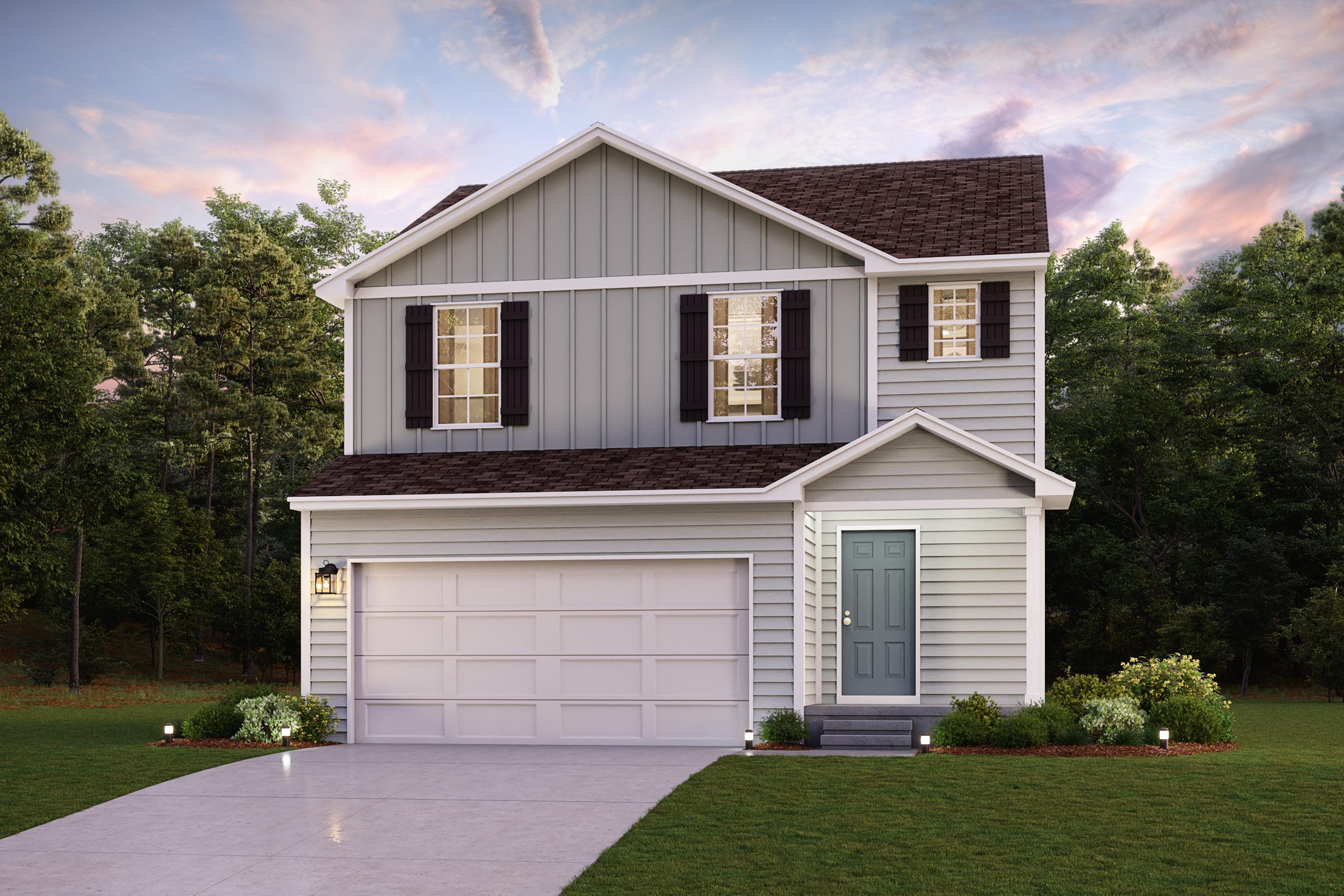 A white house with a garage.