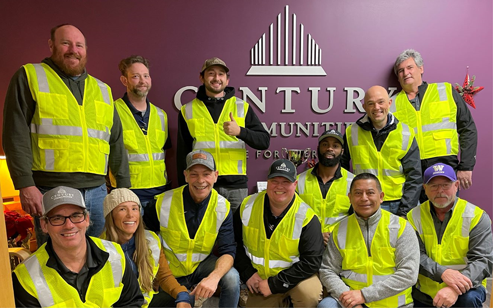 A group of people in yellow vests.